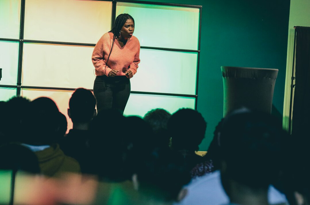 confident person speaking to audience