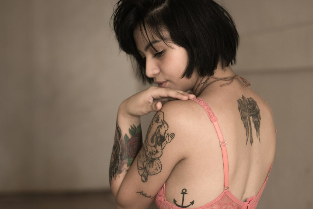 Studio portrait of a Brazilian woman with short hair